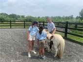 MTPD Police Youth Week students pet horses at Freedom Reins