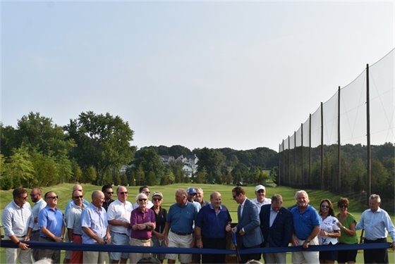 Group photo of ribbon cutting