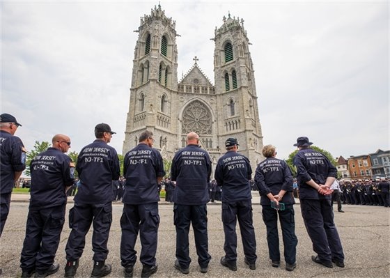 Group photo with MTFD Chiefs and Middletown Fire Marshal at Augusto's funeral