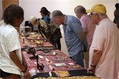 Photo of attendees viewing the artifacts