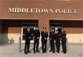Photo of new officers with chief and deputy chiefs