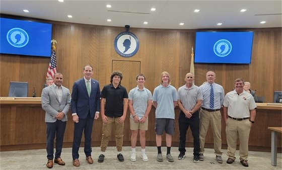 Group photo of Mayor Perry, baseball team, and BOE President Frank Capone