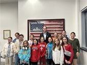 Group photo of Girl Scout Troop 60049 with Mayor Tony Perry
