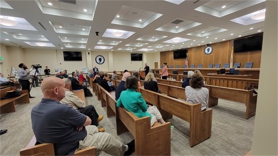 Photo of presenter and guests