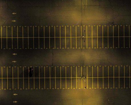 The new parking spaces are marked with yellow striping.