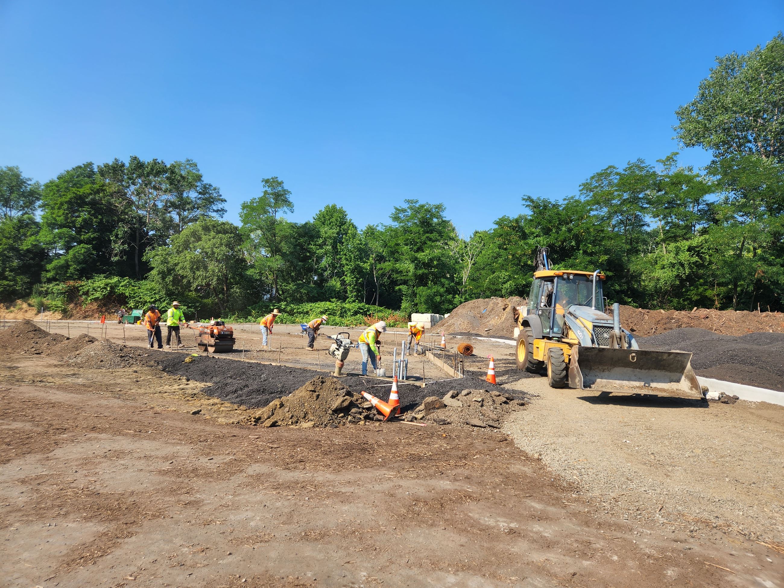 As of 7/13/22, the contractor has mobilized to the site and begun the demolition work necessary for the proposed improvements. New concrete curbs and sidewalks have been poured. New electrical conduit