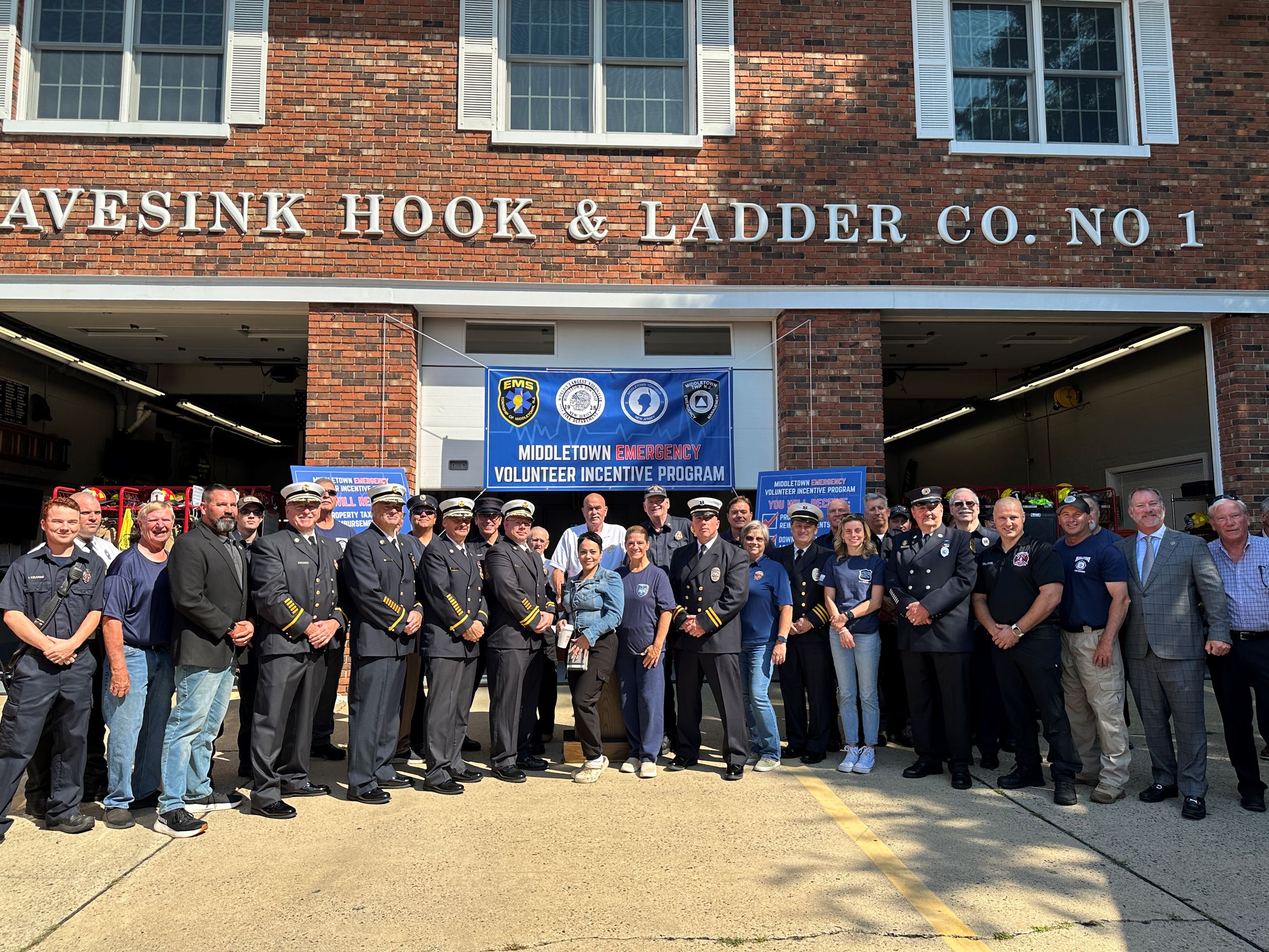 Group photo of volunteers at Middletown Emergency Volunteer Incentive Program Press Conference