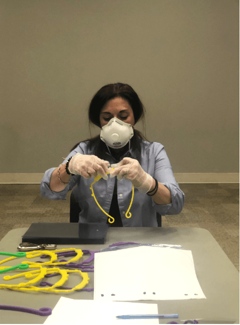 Wendy Latona assembling face shield